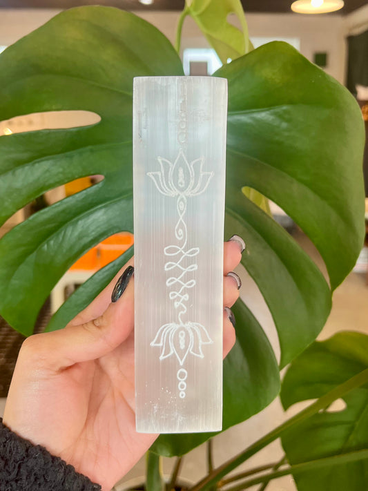 Polished Selenite with lotus engraving