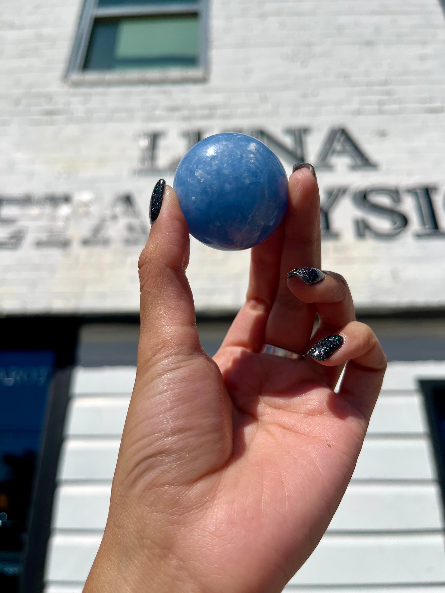 Blue Calcite Palm Stone - Luna Metaphysical
