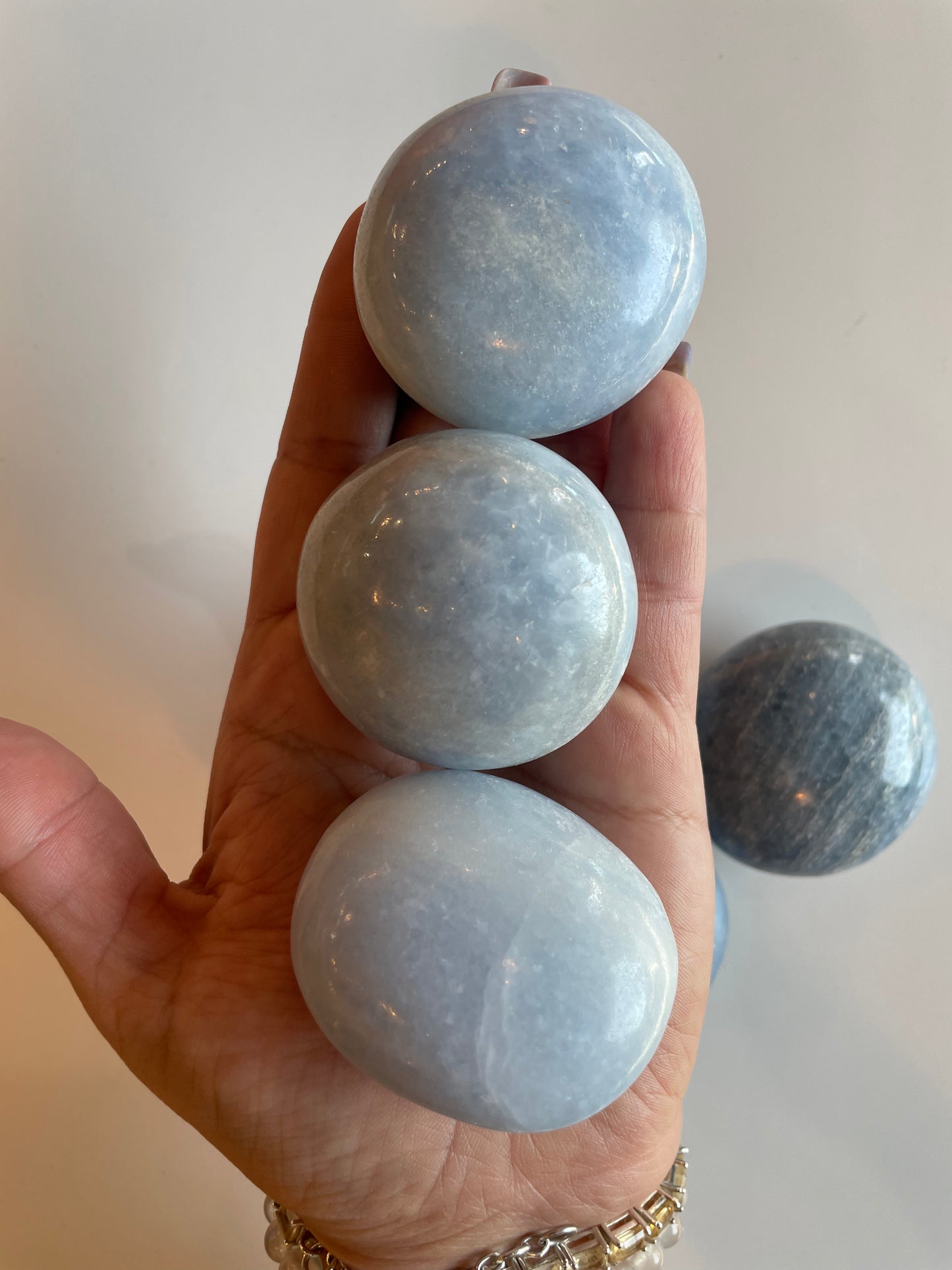 Blue calcite palm stones