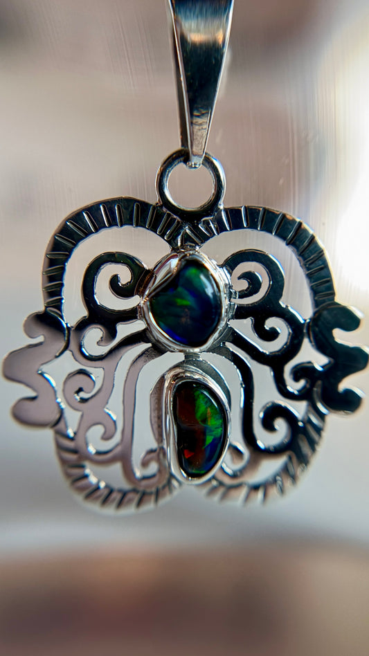 Sterling Silver Black Opal Pendant with Mayan-Inspired Design